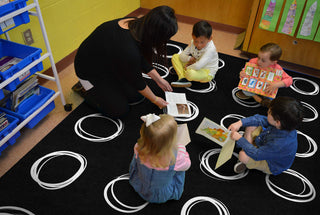 Flagship Carpets Circle Sampler Abstract Classroom Educational Area Rug for Kids and Teachers, Durable Quality for Schools, Preschool, Daycare, & Learning Centers, 7'6" x 12', Black